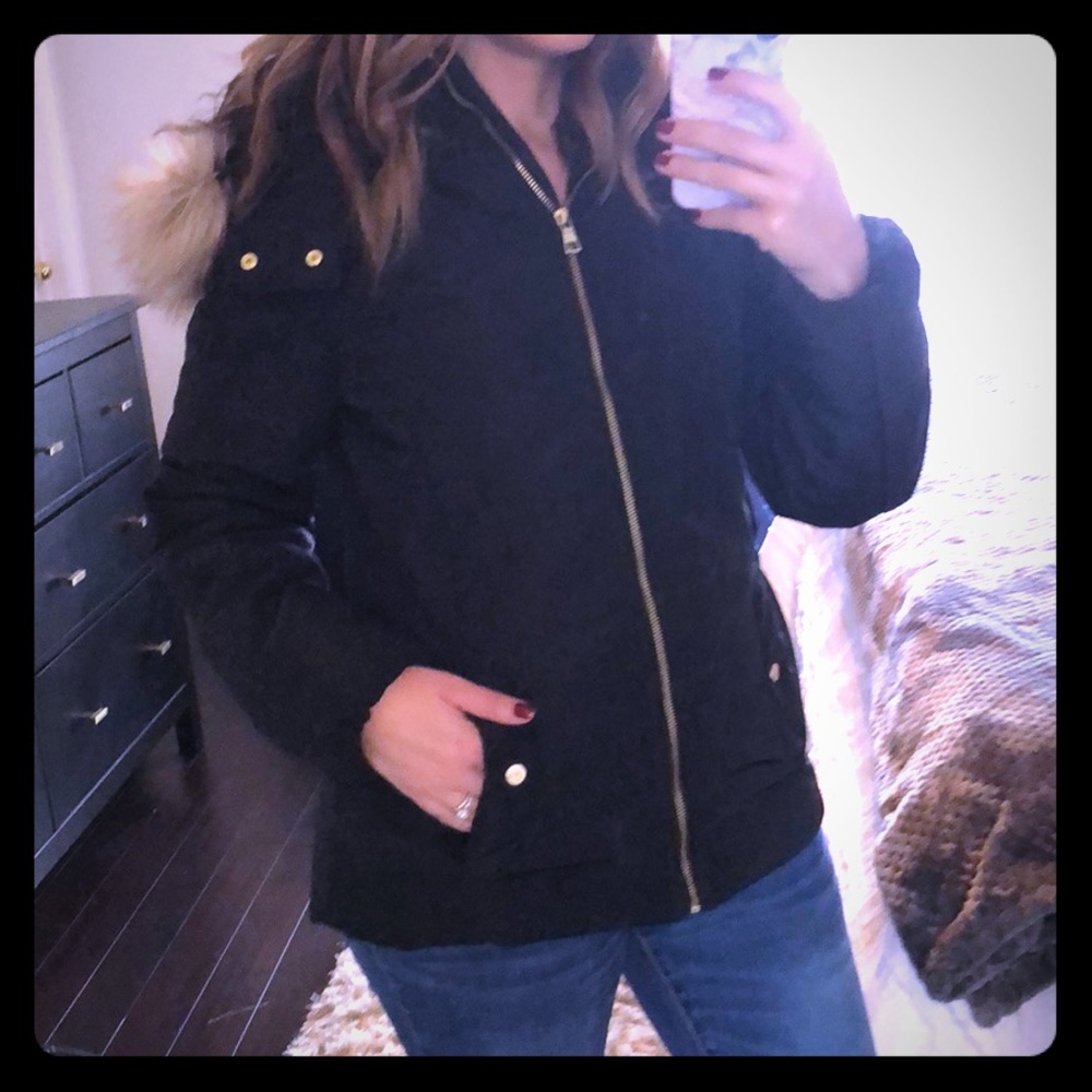 Black puffer cost with faux fur hood